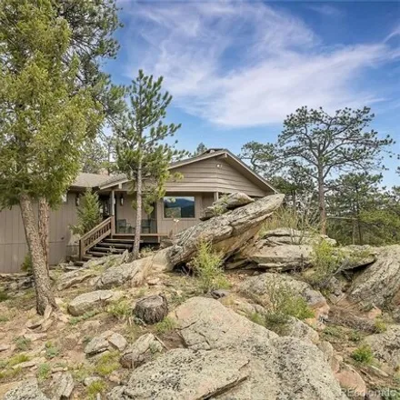 Buy this 3 bed house on 31407 Quarter Horse Road in Evergreen, CO 80439