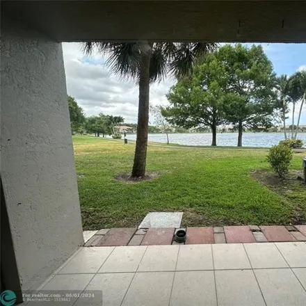 Buy this 3 bed condo on Wiles Road in Coconut Creek, FL 33073