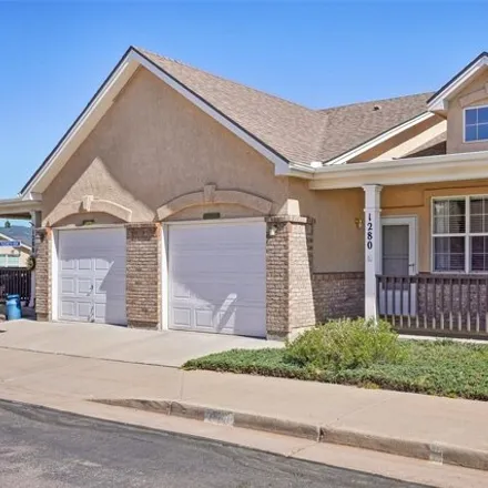 Buy this 2 bed townhouse on 1280 Paula Cir in Monument, Colorado