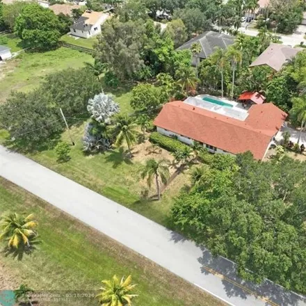 Buy this 5 bed house on 12376 Northwest 27th Street in Plantation, FL 33323
