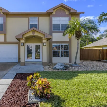 Buy this 4 bed house on 2495 Wild Wood Drive in Melbourne, FL 32935