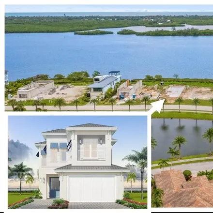 Buy this 4 bed house on 4801 South Harbor Drive in Gifford, FL 32967