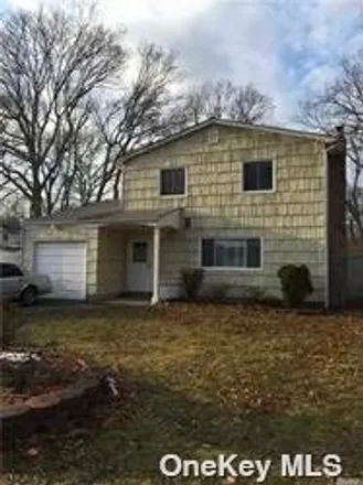 Buy this 4 bed house on 105 Shinnecock Avenue in Mastic, NY 11950