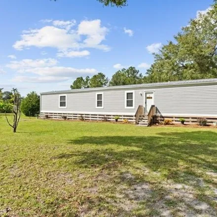 Buy this studio apartment on 199 Nathan Street in Wewahitchka, FL 32465