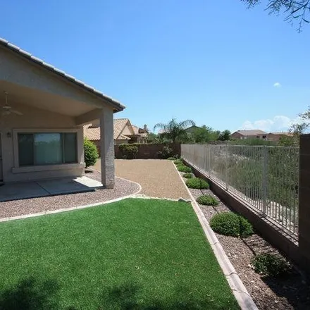 Rent this 4 bed house on 918 East Gibbon River Way in Tucson, AZ 85718