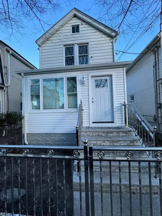 Buy this 4 bed house on 123-35 135th Street in New York, NY 11420