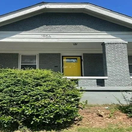 Buy this 4 bed house on 1959 Lamar Avenue in Memphis, TN 38114