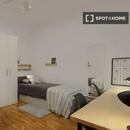 Rent this 9 bed room on Carrer de Ferran Valls i Taberner in 08001 Barcelona, Spain