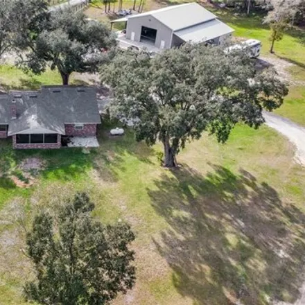 Buy this 5 bed house on Cypress Lakes Drive in Polk County, FL 33808