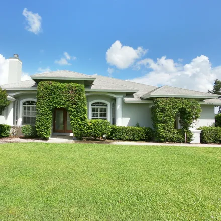 Buy this 4 bed townhouse on 2001 Gray Mare Way in Wellington, Palm Beach County