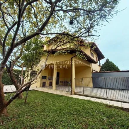 Buy this 3 bed house on Rua dos Gerânios Floridos in Carvoeira, Florianópolis - SC