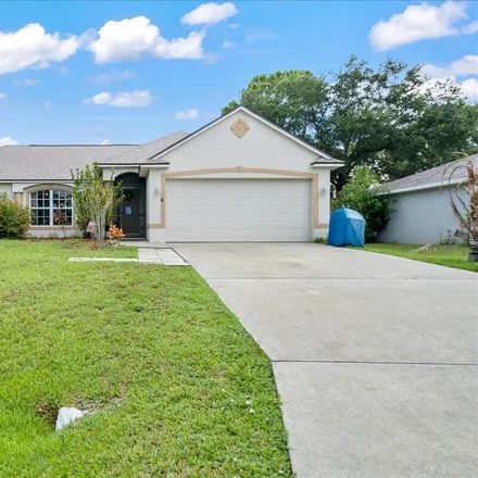 Buy this 3 bed house on 2396 Rhinehart Road Southeast in Palm Bay, FL 32909