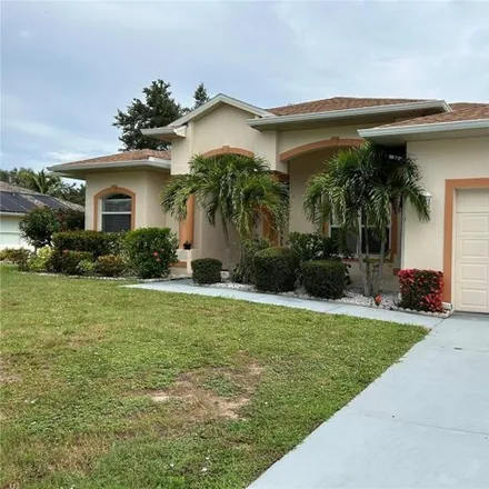 Rent this 4 bed house on 18304 Caddy Avenue in Port Charlotte, FL 33948