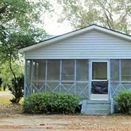 Buy this 3 bed house on 700 East 1st Street in Wewahitchka, FL 32465