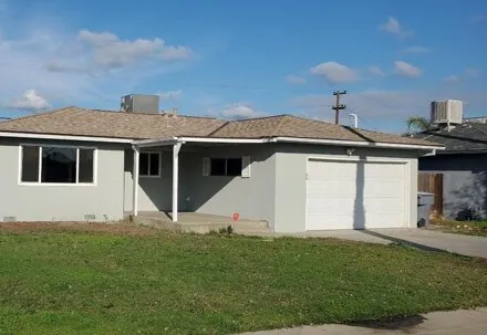 Rent this 4 bed house on 899 W Fairmont Ave in Clovis, California