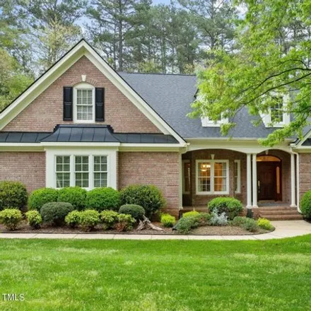 Buy this 4 bed house on 9230 Hometown Drive in Raleigh, NC 27615