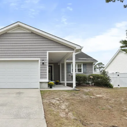 Buy this 3 bed house on 5063 Glen Cove Drive in Oak Island, Brunswick County