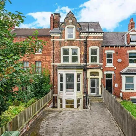 Rent this 9 bed townhouse on Asa Briggs House in Belle Vue Road, Leeds