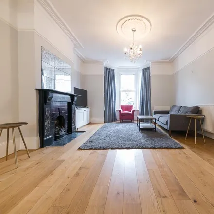 Rent this 4 bed townhouse on Nevis Road in London, SW17 7QX