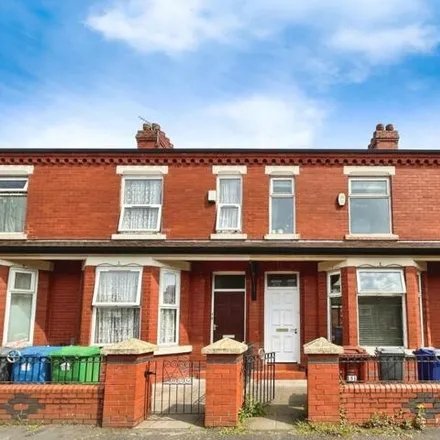 Rent this 4 bed townhouse on Deramore Street in Manchester, M14 4BY