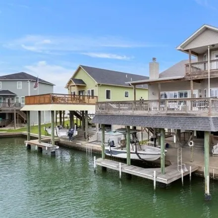 Buy this 4 bed house on 1527 Windsong Way in Tiki Island, Galveston County
