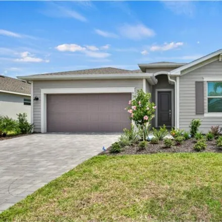 Rent this 4 bed house on 8693 Coco Bay Blvd in Englewood, Florida