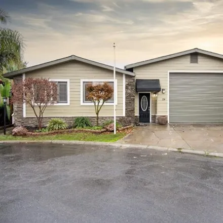 Buy this studio apartment on 98 Whispering Way in Terminous, San Joaquin County