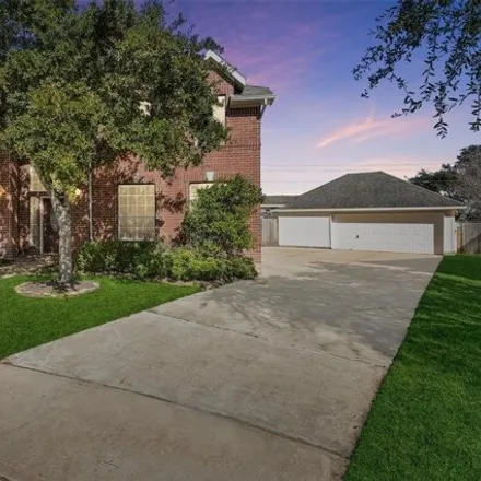 Buy this 5 bed house on 7799 Great Pecan Lane in Sugar Land, TX 77479