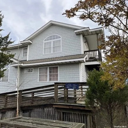 Rent this 5 bed house on 340 Surf Road in Village of Ocean Beach, Islip
