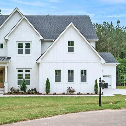 Buy this 6 bed house on Utley Bluffs Drive in Holly Springs, NC 27540