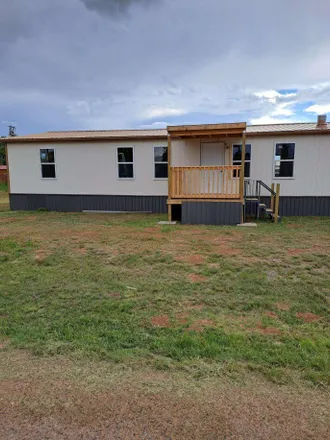 Buy this 4 bed house on 1101 3rd Street in Moriarty, NM 87035