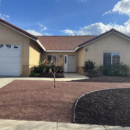 Rent this 4 bed house on 230 Telega Place in Palmdale, CA 93550
