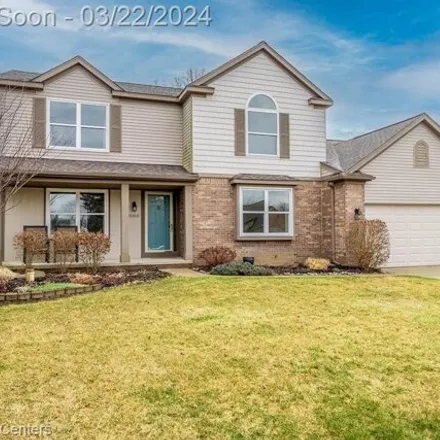 Buy this 4 bed house on 5280 Riverwalk Trail in Commerce Charter Township, MI 48382
