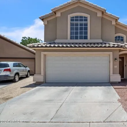 Buy this 4 bed house on 121 W Melody Dr in Gilbert, Arizona