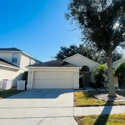 Rent this 3 bed house on 858 Troon Circle in Polk County, FL 33897