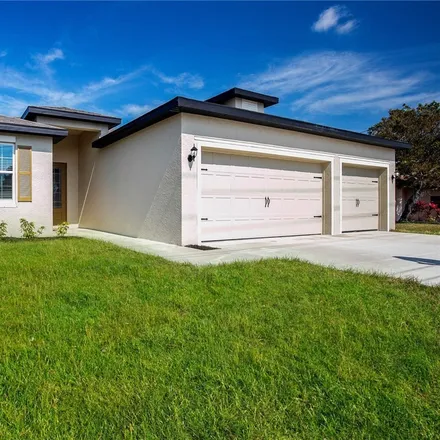 Buy this 4 bed house on 2712 Southeast 12th Place in Cape Coral, FL 33904