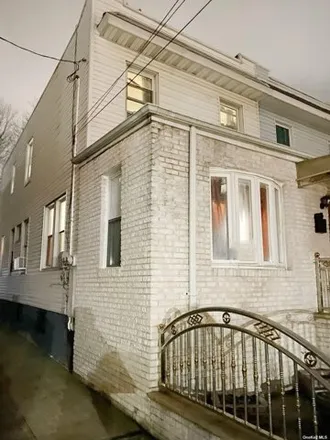 Buy this 4 bed house on 87-19 129th Street in New York, NY 11418