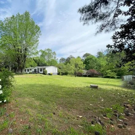 Buy this 4 bed house on 5219 Bogus Road in Hall County, GA 30506