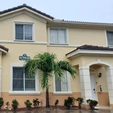 Rent this 4 bed townhouse on 6930 Northwest 177th Street in Miami-Dade County, FL 33015