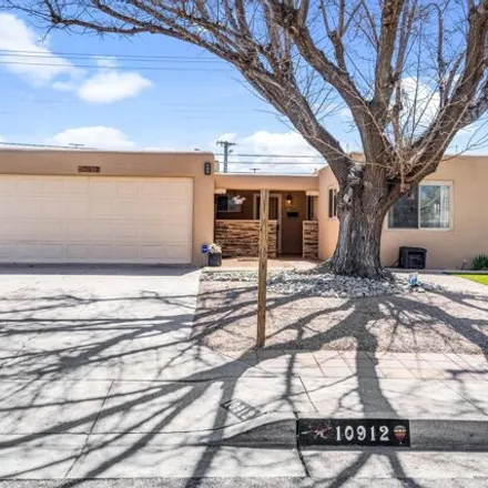 Buy this 4 bed house on 10974 Woodland Avenue Northeast in Matheson Park, Albuquerque