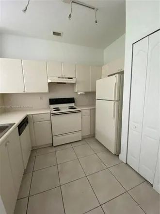 Rent this 3 bed apartment on 7090 Northwest 177th Street in Miami-Dade County, FL 33015