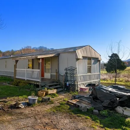 Buy this studio apartment on Rifle Range Lane in Greene County, TN