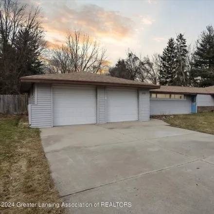 Buy this 4 bed house on 5945 Okemos Road in Meridian Charter Township, MI 48823