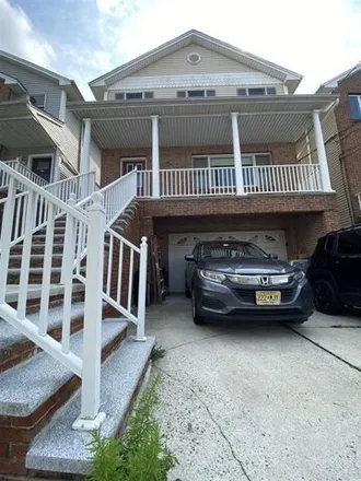 Rent this 3 bed house on 168 West 54th Street in Bayonne, NJ 07002