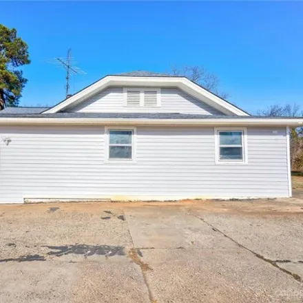 Buy this 2 bed house on 477 East Grover Street in Logan Street Public Housing, Shelby