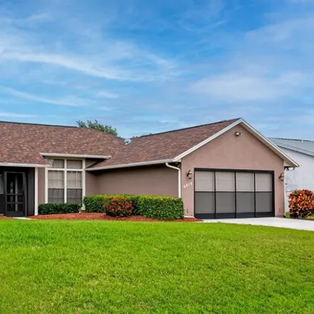 Buy this 3 bed house on 6869 Northwest Dragon Street in Port Saint Lucie, FL 34983