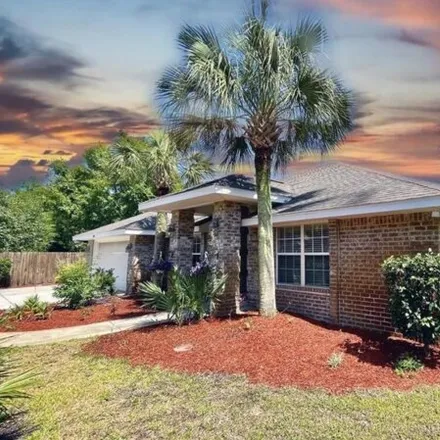 Buy this 4 bed house on 5021 Mandavilla Blvd in Gulf Breeze, Florida