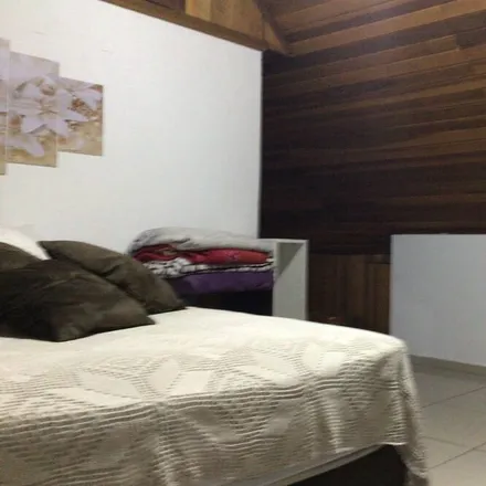 Rent this 4 bed house on Curitiba in Região Metropolitana de Curitiba, Brazil