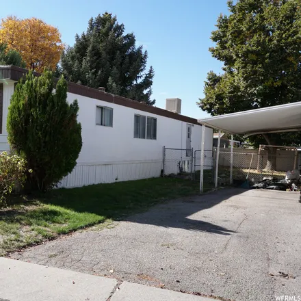 Buy this 2 bed house on 5063 South Escondido Street in Salt Lake County, UT 84117
