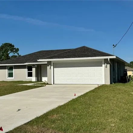 Buy this 3 bed house on 812 Columbus Boulevard in Lehigh Acres, FL 33974